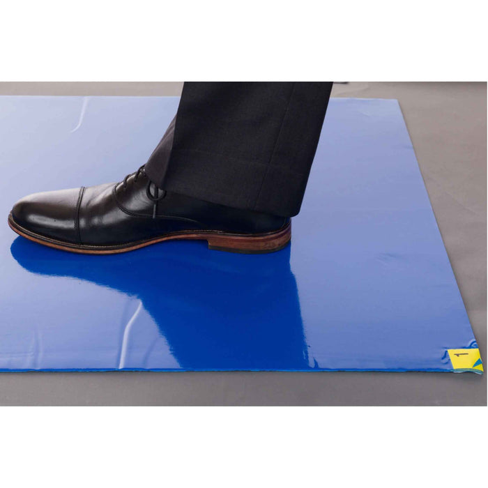 shoe on blue sticky mat